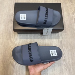 B alenciaga Logo Embossed Pool Slides