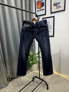 True religion boot cut dark blue imported denim with brand buttons