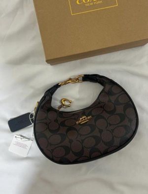 coac_h mini jonie crossbody bag with box 740