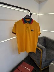 Gucc i imported box pack polo tshirt with brand buttons and steel logo bottle yellow gold