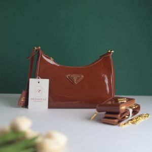 PRAD_A RE EDITION GLOSSY BAG WITH SLIGHTLY DAMAGED BOX DUST BAG CARD BROWN 