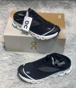 On cloud 6 coastal mule black white