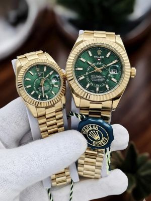 Rolex_Couple_Sky_Dweller_Gold-Green