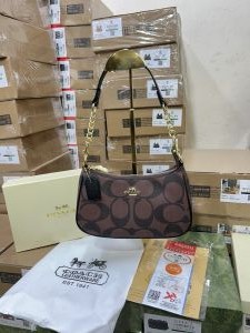COAC_H Teri Shoulder Bag In Signature Canvas dual belts with og box 910