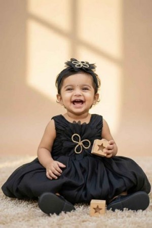 Black Party Frock With Oversized Floral Appliqu And Pleated Shine Finish For Girls