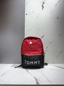 Tomm_y hilfiger red and navy blue colorblocked backpack with a white logo print 1005