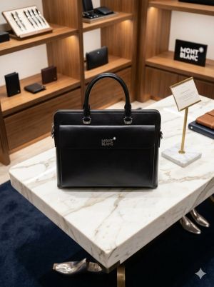 M_ontblanc_ Laptop bag from the Urban Collection is crafted from black leather and features the brands signature emblem on the front with Dust Cover premium quality