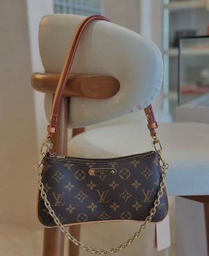 Louiss Vuitton Pochette Liv Empreinte Brown Bag With Original Box Dustcover Tags And Carry Bag