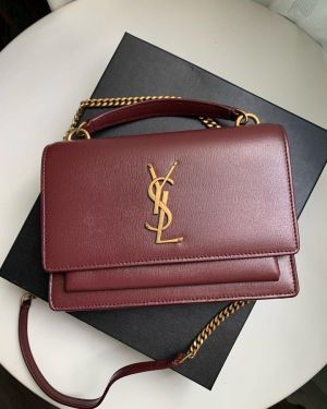 Saintt_Laurent_ bag features a prominent gold-tone YSL plaque and is packaged in its original box premium quality