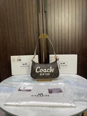 Coac teri mini crossbody bag in signature canvas with graphic & original box 731