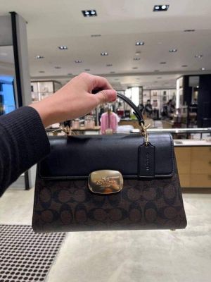 Coaach Eliza Top Handle bag featuring the iconic signature coated canvas Bag With Box premium quality