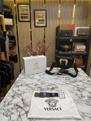 Versacce shoulder bag in gold accents with magnetic closure bag (Black)