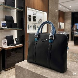 Montt_blanc_ Laptop bag from the Urban Collection is crafted from black leather and features the brands signature emblem on the front with Dust Cover premium quality