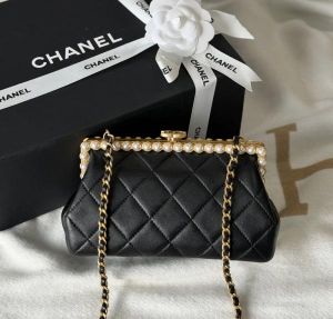 Chanel_ clutch features quilted lambskin leather a decorative pearl and gold tone metal frame and a chain strap Bag with box premium quality